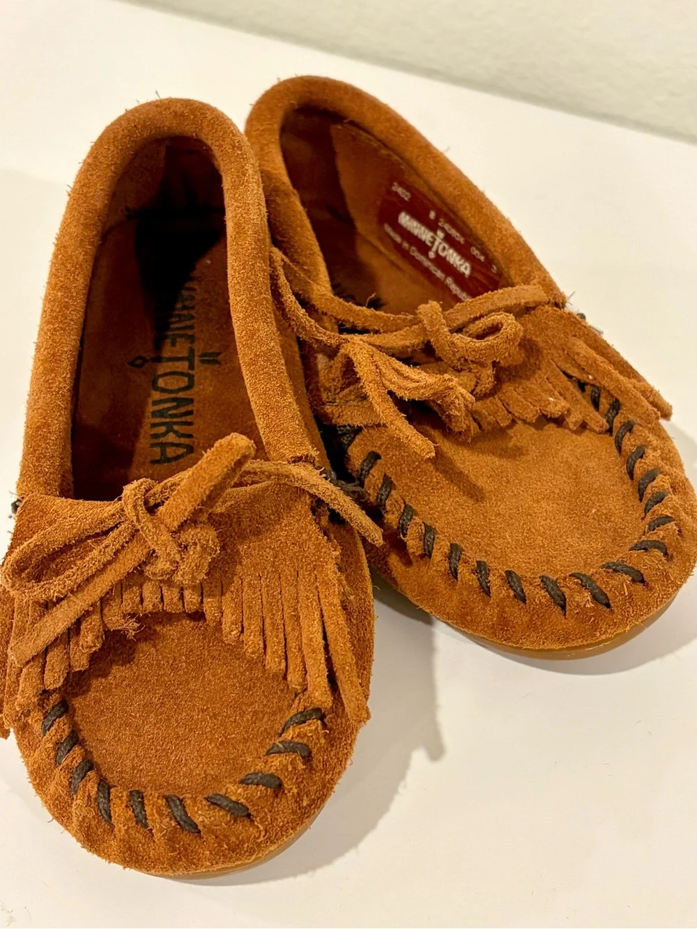 Authentic Minnetonka toddler size 8 Suede Fringe Moccasins - Cognac Brown